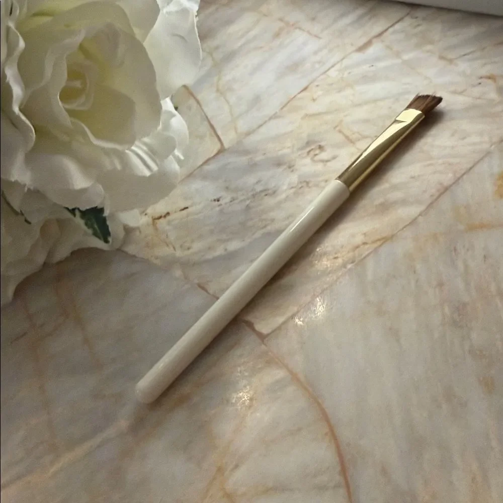 White Makeup Brush with Gold Accent